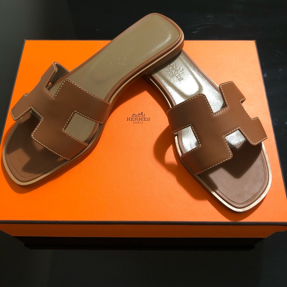 Hermès Oran Sandals in Gold Piqures Ecrues